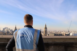 Ventro employee in high vis looking over London skyline